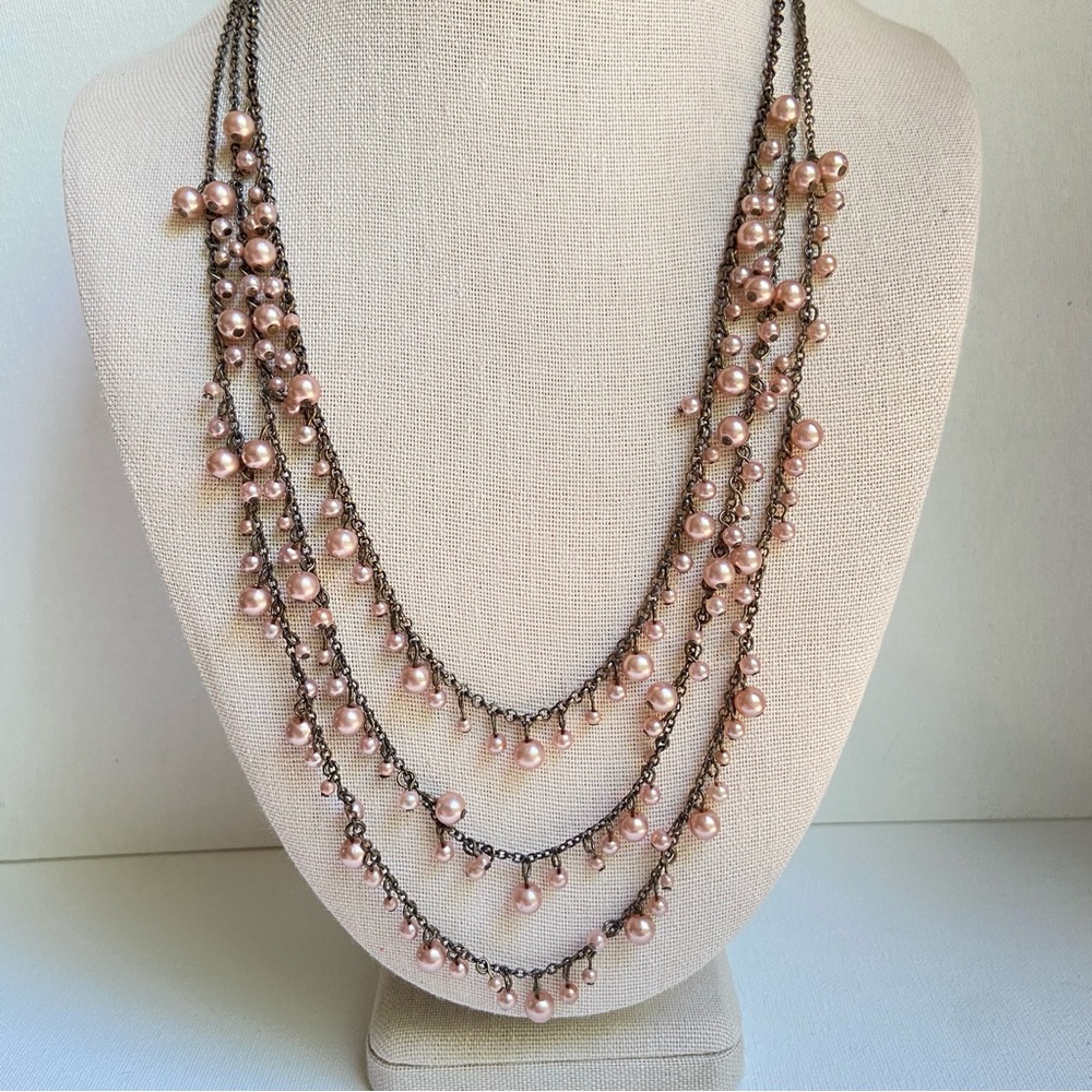 Robert Rose necklace with pale champagne faux pearls on three bronze tone chains